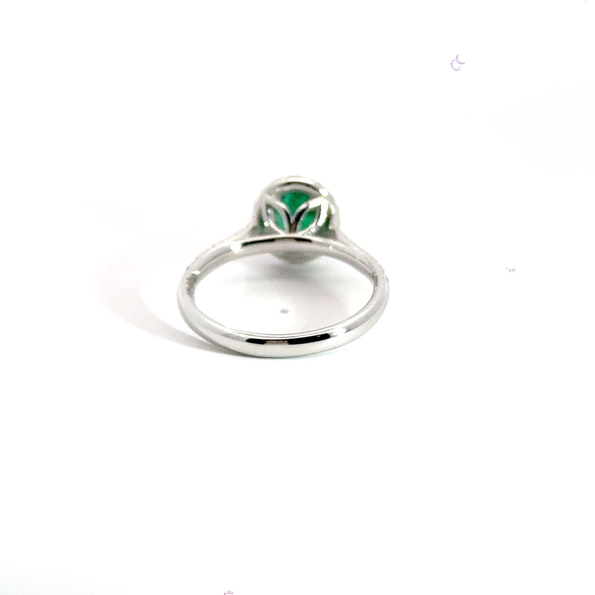 Platinum Columbian Emerald Diamond Halo Ring Aces Jewellers