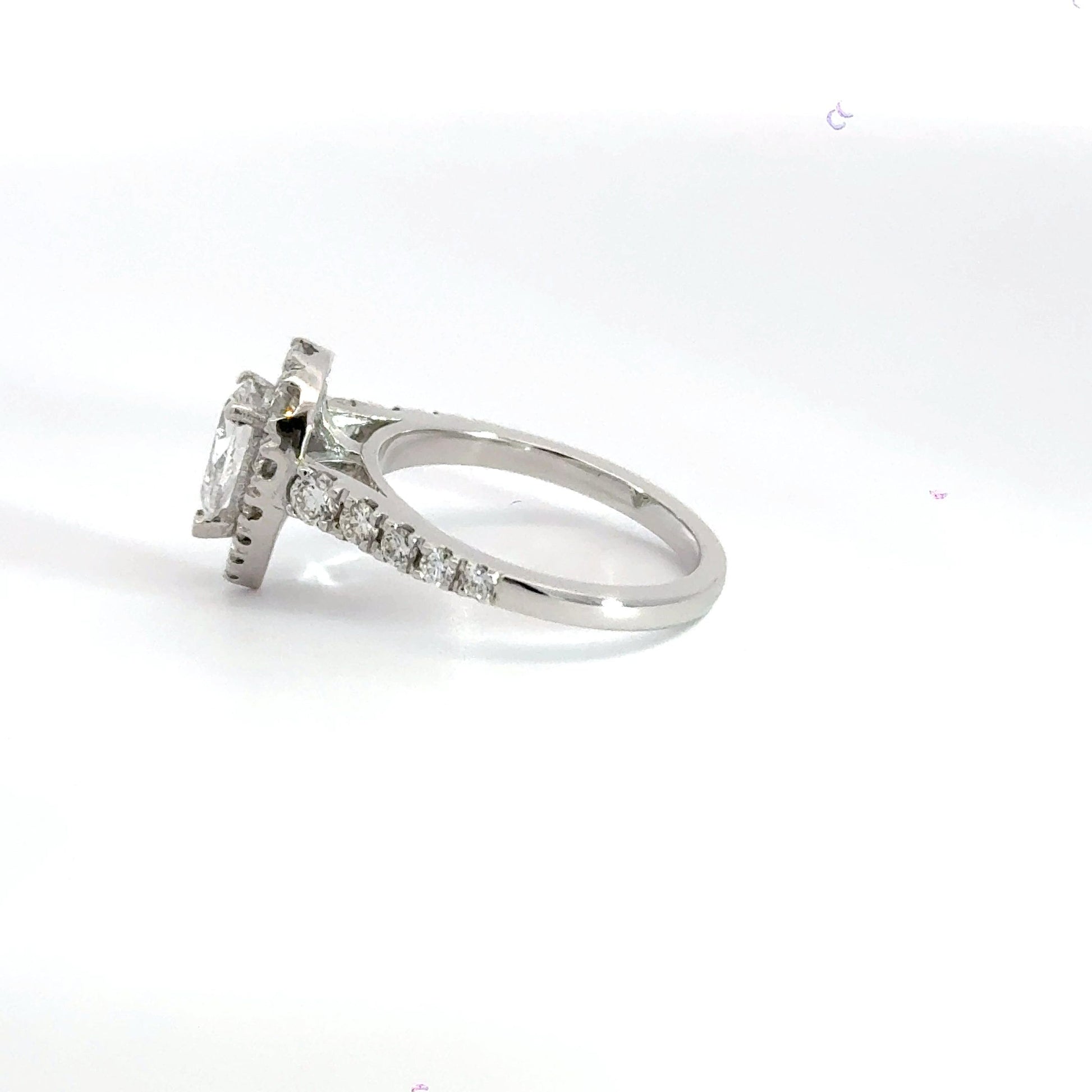Platinum Teardrop Diamond Claw Set Diamond Halo Ring Aces Jewellers