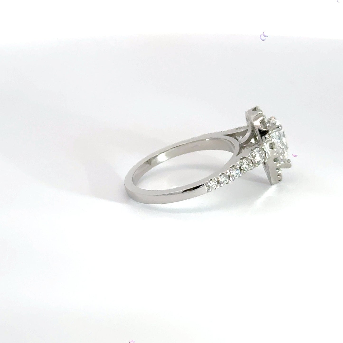 Platinum Teardrop Diamond Claw Set Diamond Halo Ring Aces Jewellers
