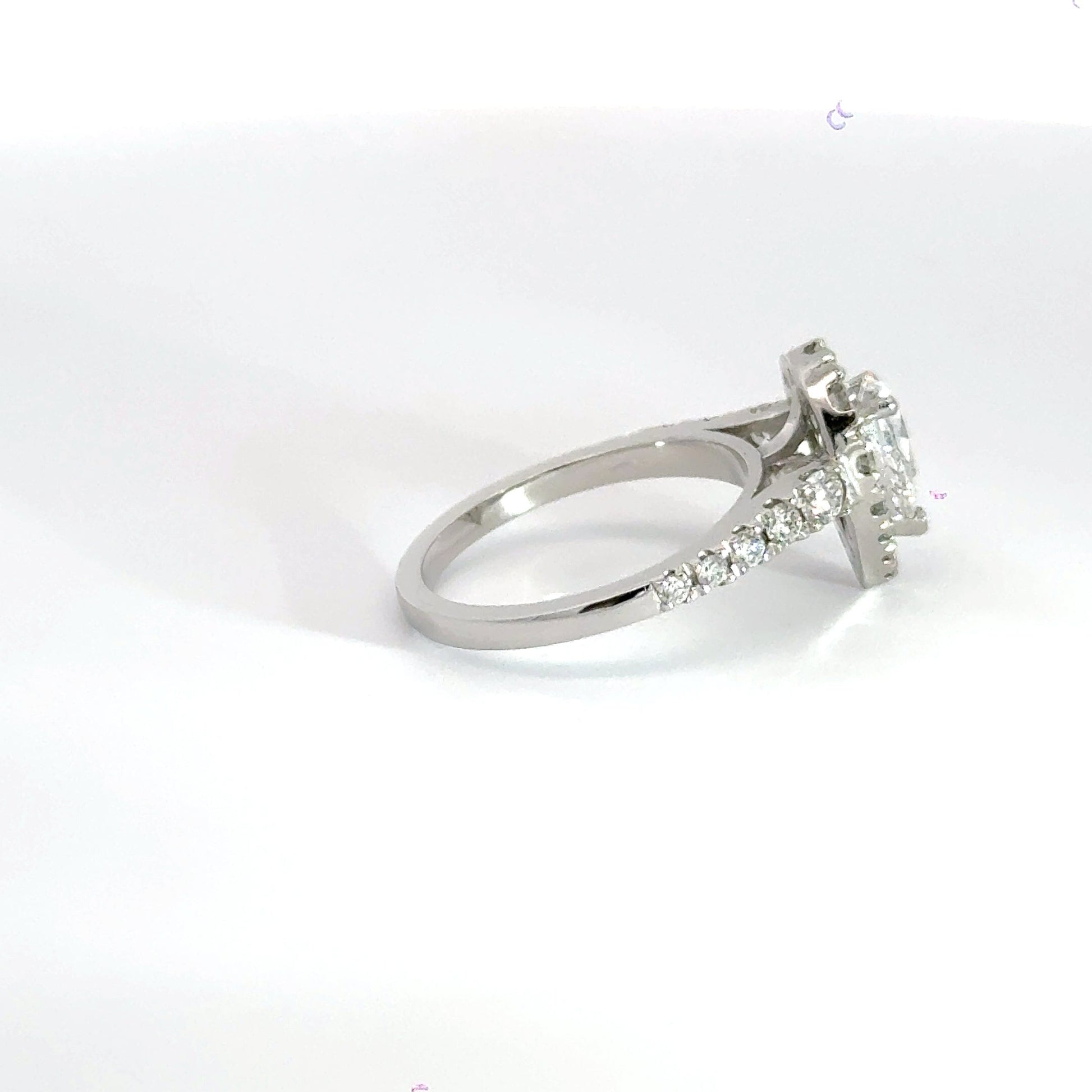 Platinum Teardrop Diamond Claw Set Diamond Halo Ring Aces Jewellers