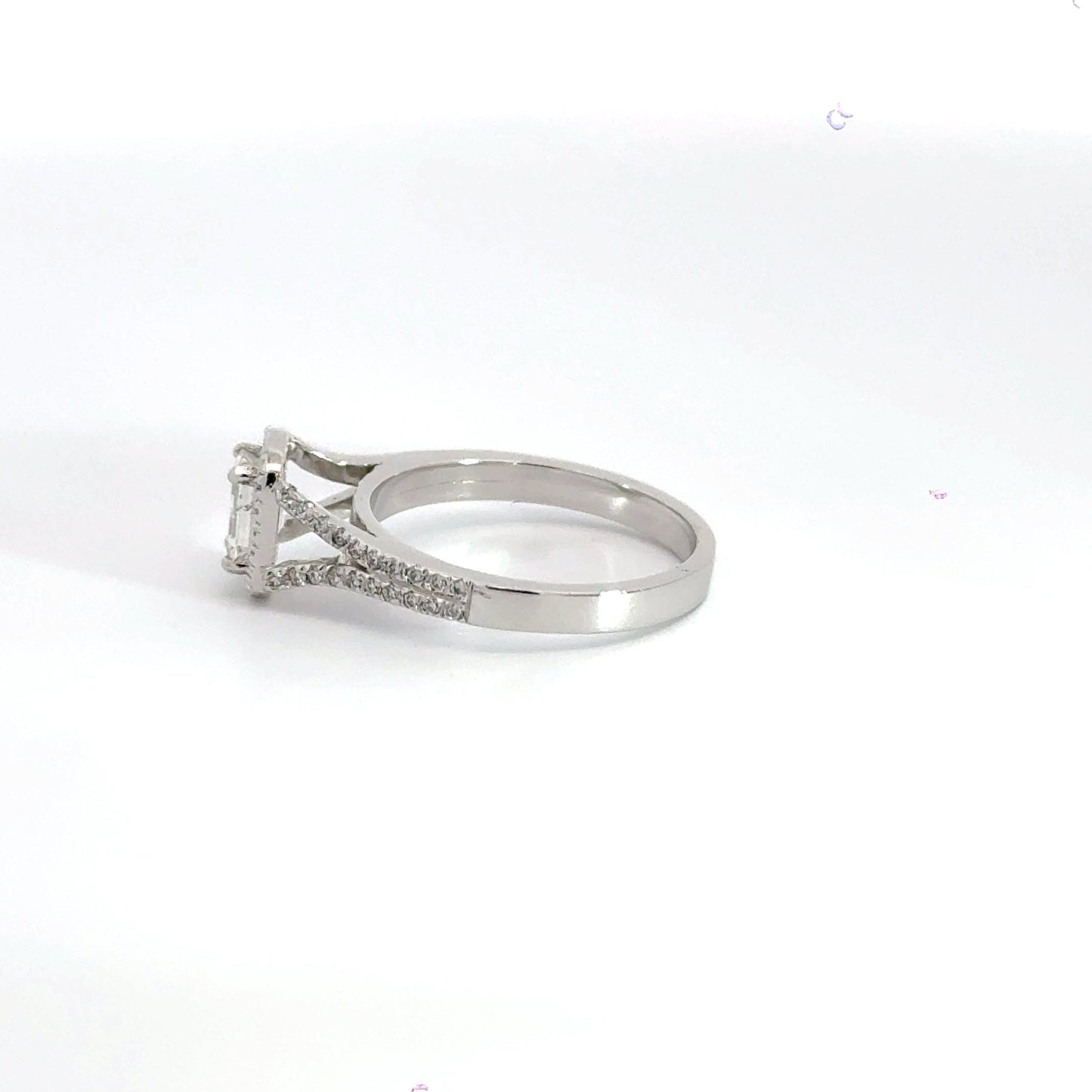 Platinum Halo Emerald Cut Diamond Ring Aces Jewellers