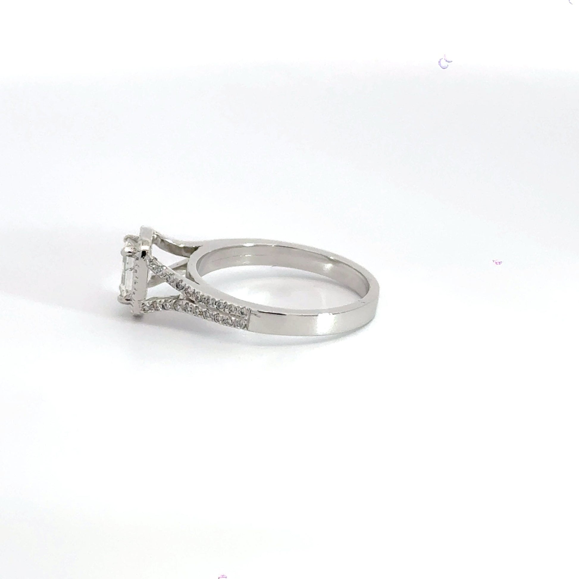 Platinum Halo Emerald Cut Diamond Ring Aces Jewellers