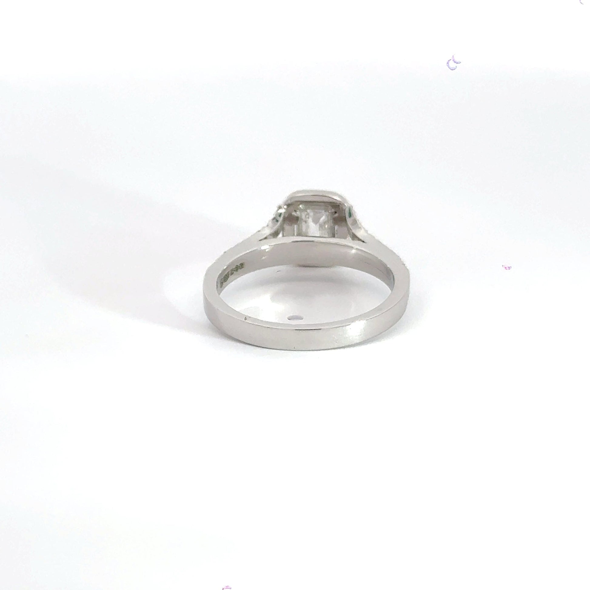 Platinum Halo Emerald Cut Diamond Ring Aces Jewellers