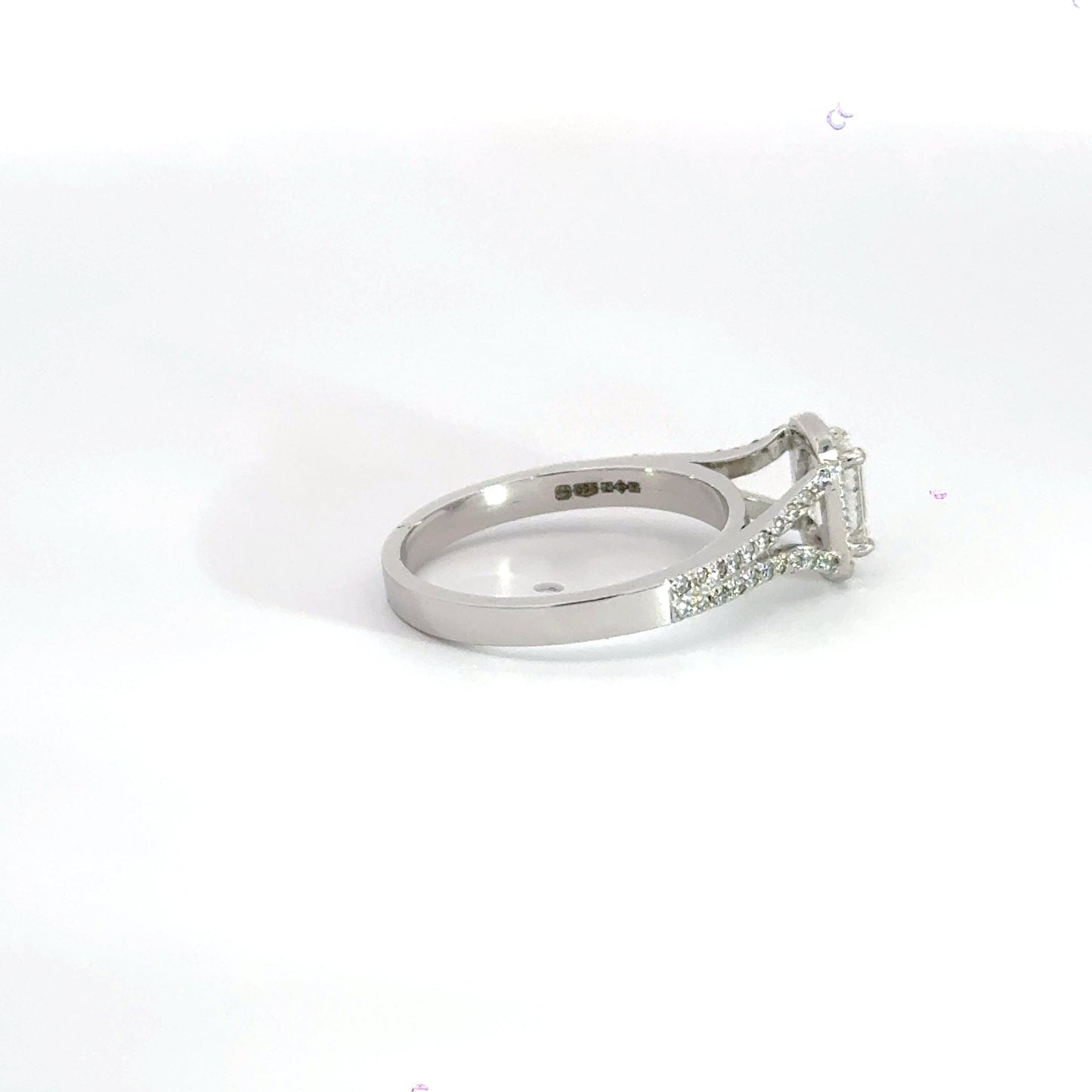 Platinum Halo Emerald Cut Diamond Ring Aces Jewellers