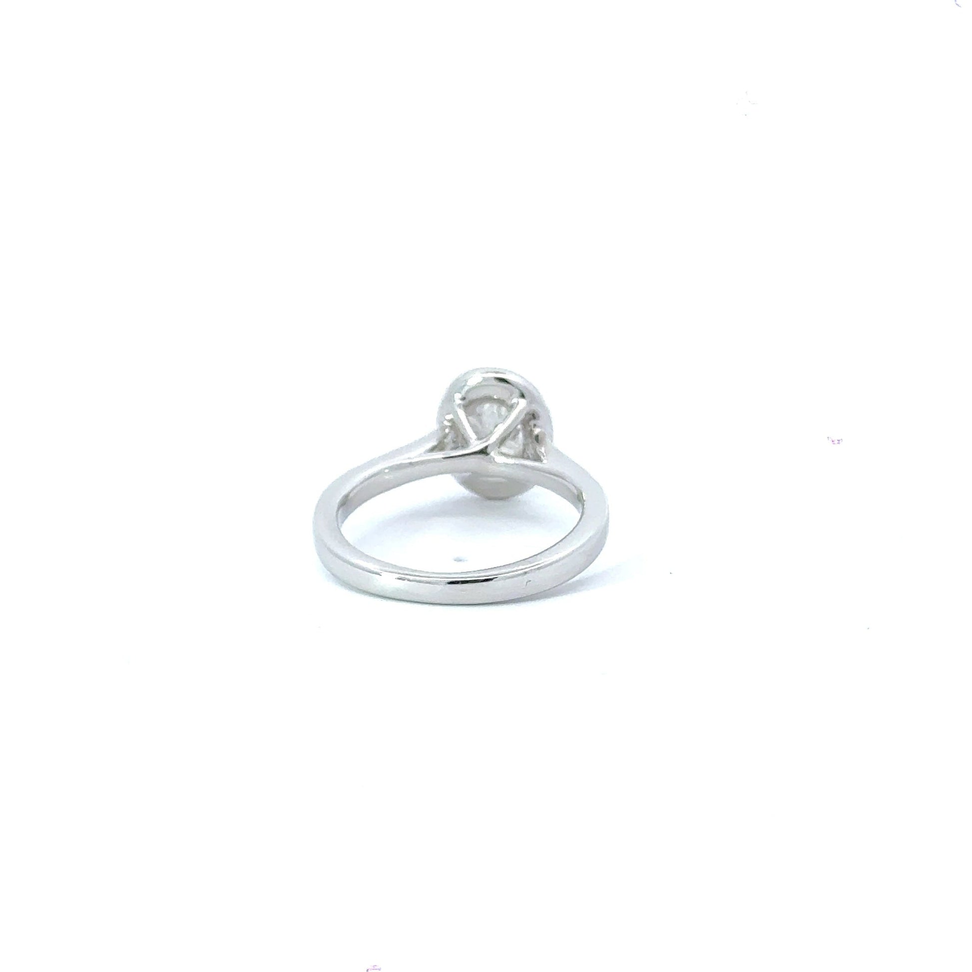 Platinum Halo Oval Diamond Ring Aces Jewellers