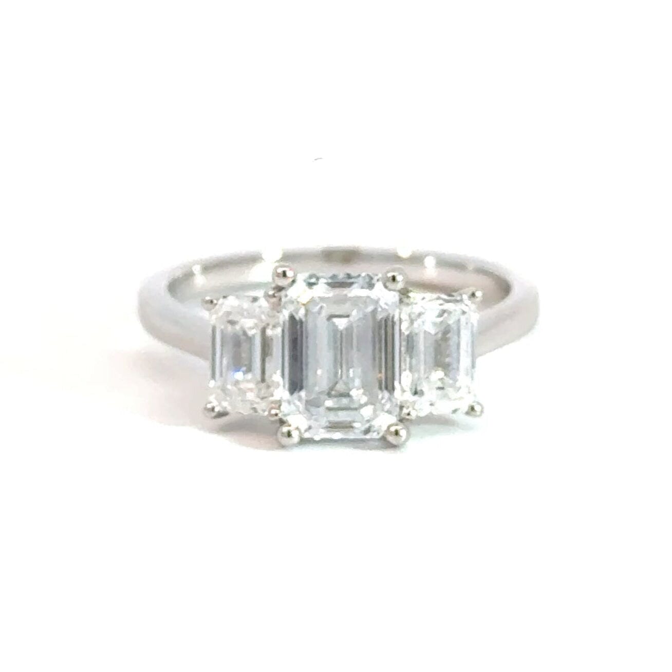18CT White Gold Emerald Cut Trilogy 2.64CT Lab Diamond Ring Aces Jewellers