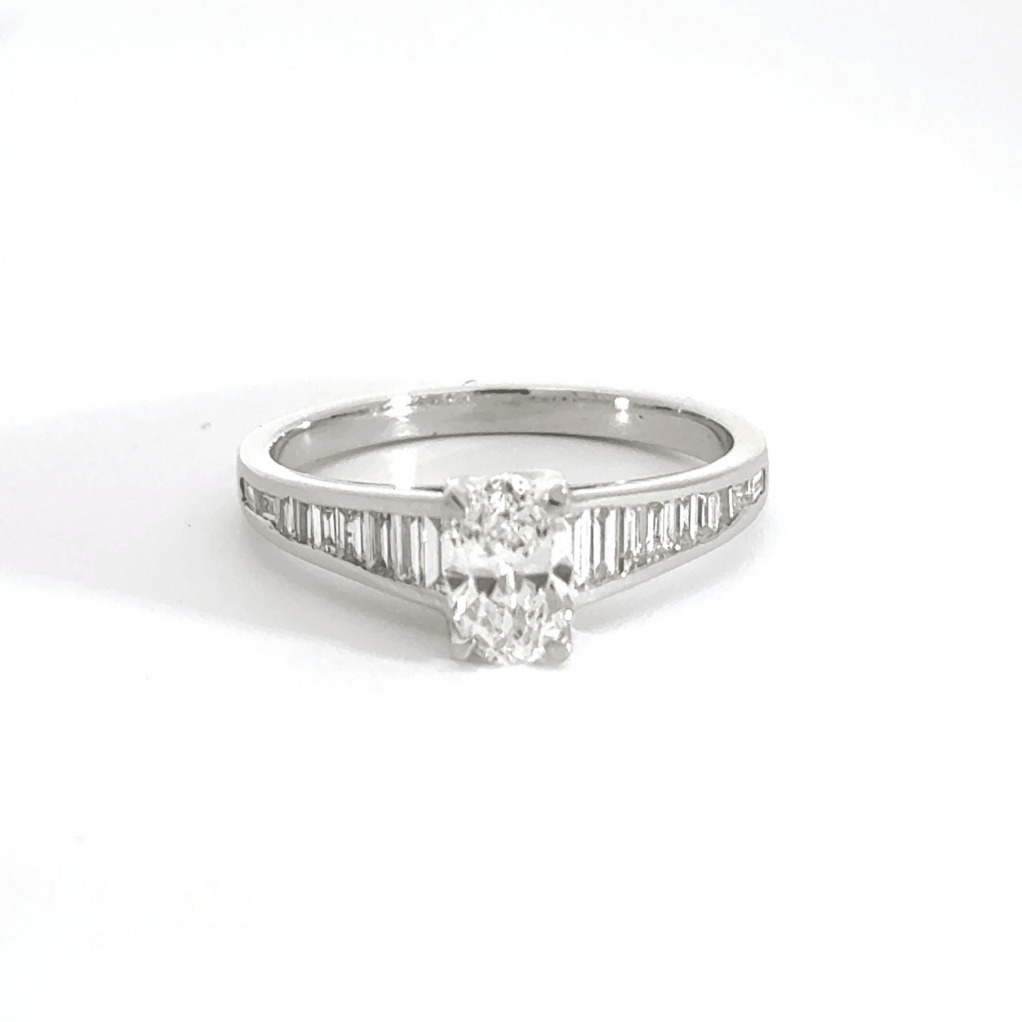 Platinum Solitaire Oval Centre Baguette Shoulder Diamond Ring Aces Jewellers