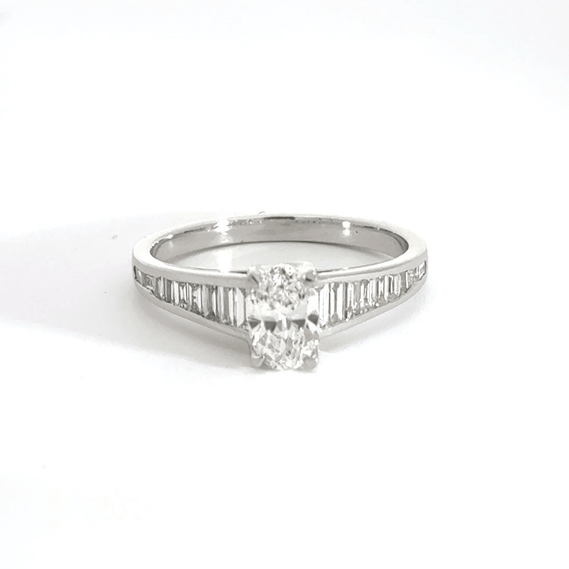 Platinum Solitaire Oval Centre Baguette Shoulder Diamond Ring Aces Jewellers