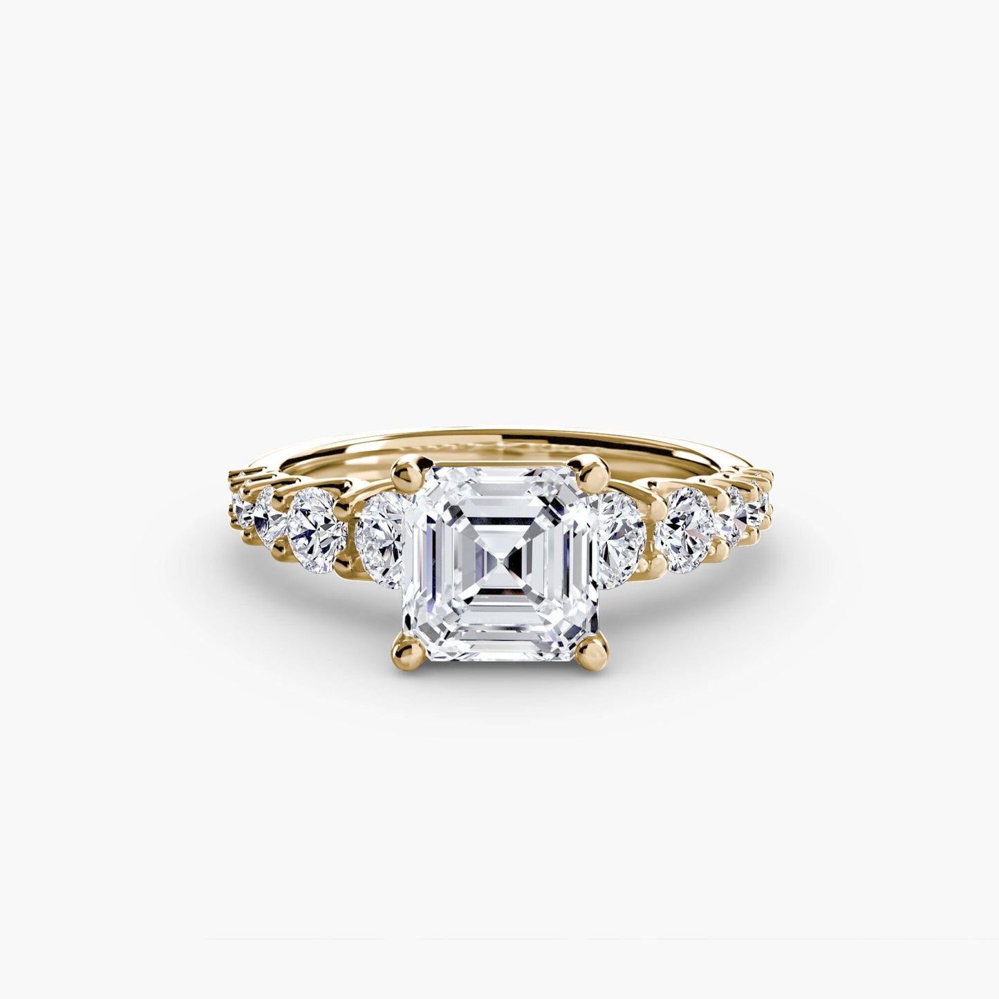 The Graduated Accent Ring setting Aces Jewellers 9K Yellow Gold Asscher 