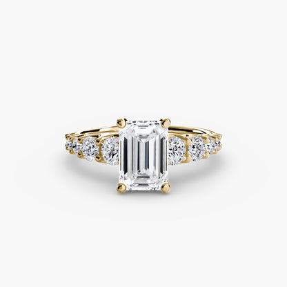The Graduated Accent Ring setting Aces Jewellers 9K Yellow Gold Emerald 