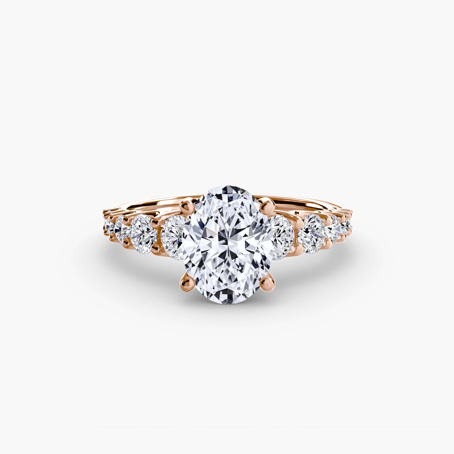 The Graduated Accent Ring setting Aces Jewellers 9K Rose Gold Oval 