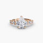 The Graduated Accent Ring setting Aces Jewellers 9K Rose Gold Pear 