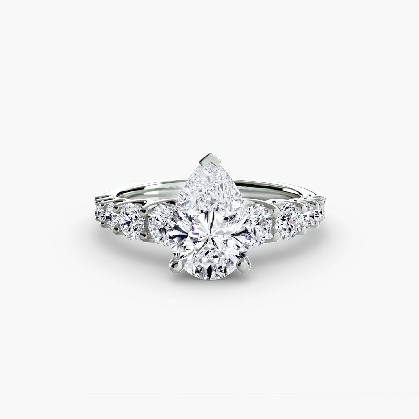 The Graduated Accent Ring setting Aces Jewellers 9K White Gold Pear 