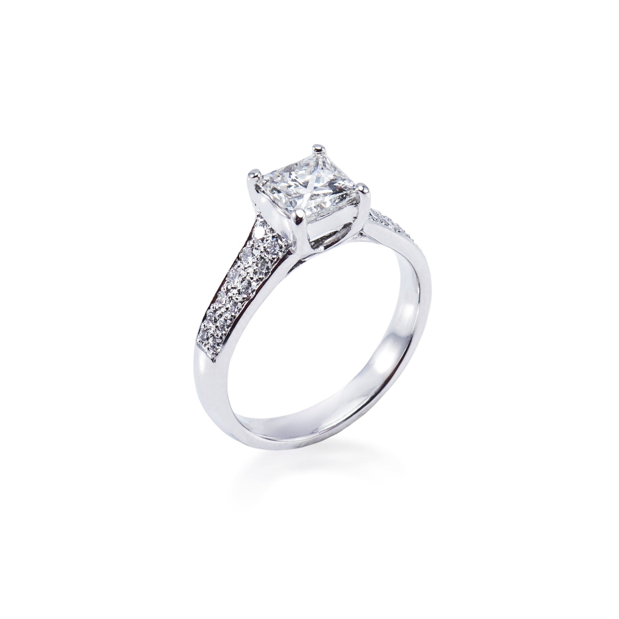 Platinum solitaire princess cut diamond ring with two rows of round brilliant diamonds on the shoulders Aces Jewellers 