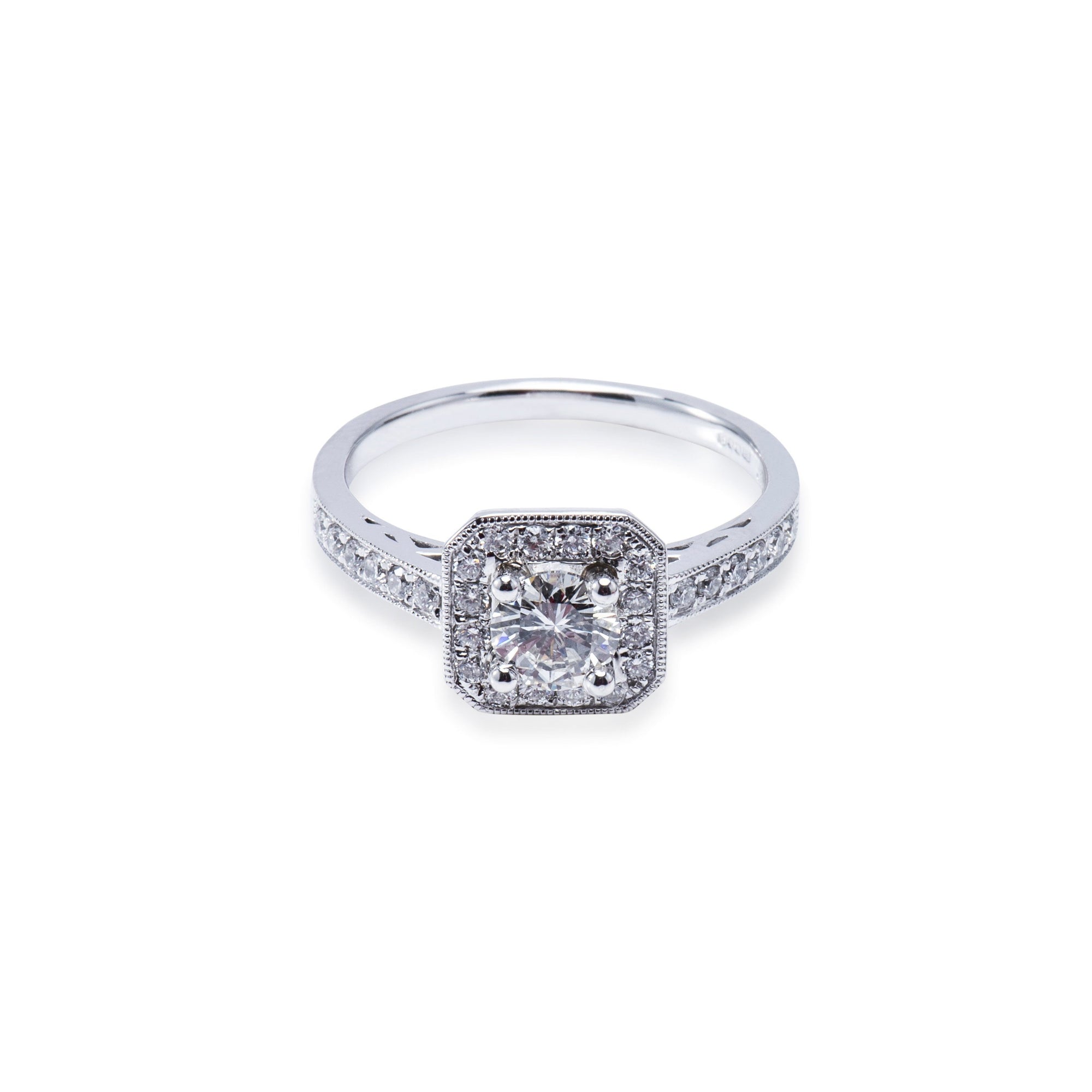 Platinum halo style diamond engagement ring. Aces Jewellers 